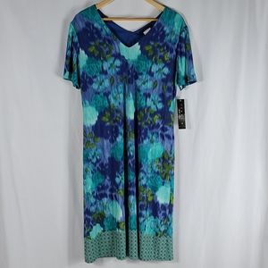 Tiana B. | Blurred Floral Midi V-Neck Dress